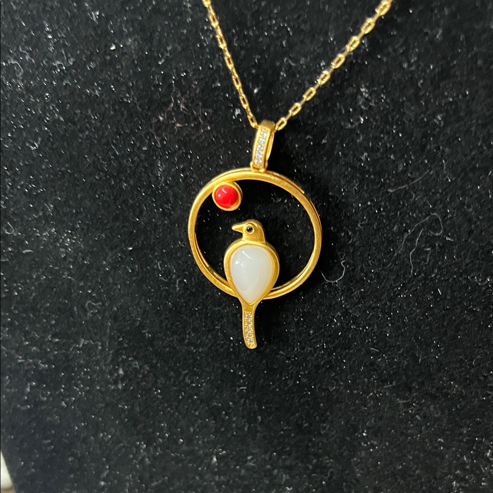 Elegant Gold and Red Bird Pendant Necklace